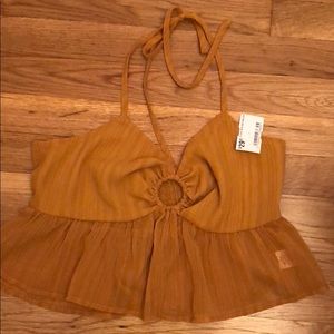 Lelis mustard cropped ring peplum top